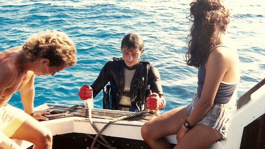 An early Careyitos photograph of divers on the boat in the 1980s